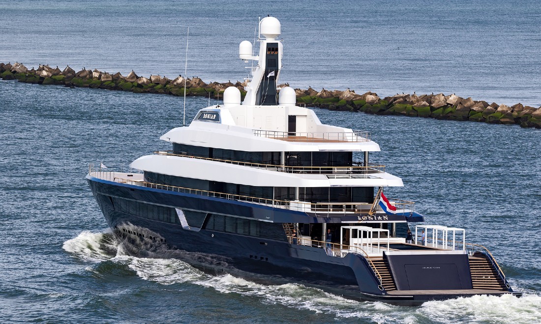 Wow! Surreal shots of a superyacht squeezing through Dutch canals