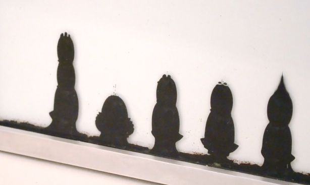 Ferrolic: A clock using magnetic fluid to spell the time